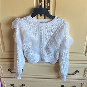 Elegant White Sweater with Ruffle Details for girl.